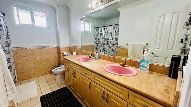 4127 W 130th St, Hawthorne, CA 90250 - bathroom featuring tile patterned floors, crown molding, double vanity, a bidet, and wainscoting