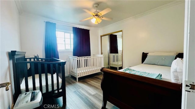 4127 W 130th St, Hawthorne, CA 90250 - bedroom featuring wood finished floors, crown molding, a closet, and a ceiling fan