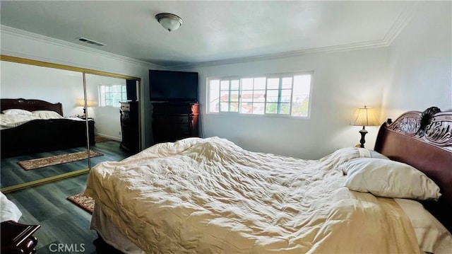 4127 W 130th St, Hawthorne, CA 90250 - bedroom with multiple windows, a closet, wood finished floors, and ornamental molding