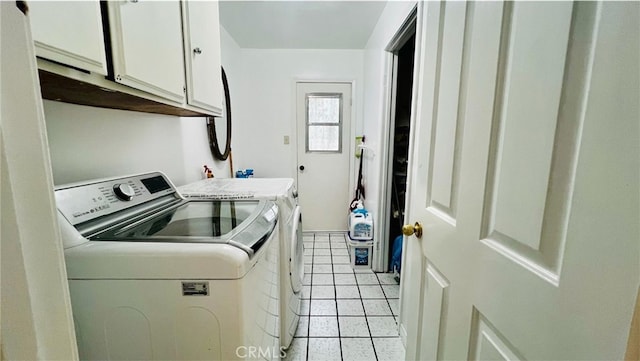 4127 W 130th St, Hawthorne, CA 90250 - washroom with cabinet space, washer and dryer, and light tile patterned floors