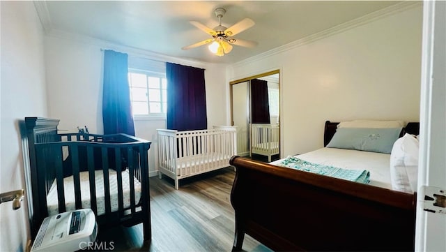 4127 W 130th St, Hawthorne, CA 90250 - bedroom featuring wood finished floors, crown molding, a closet, and ceiling fan