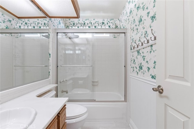 9 Edgestone, Irvine, CA 92606 - full bath featuring wallpapered walls, toilet, vanity, and combined bath / shower with glass door