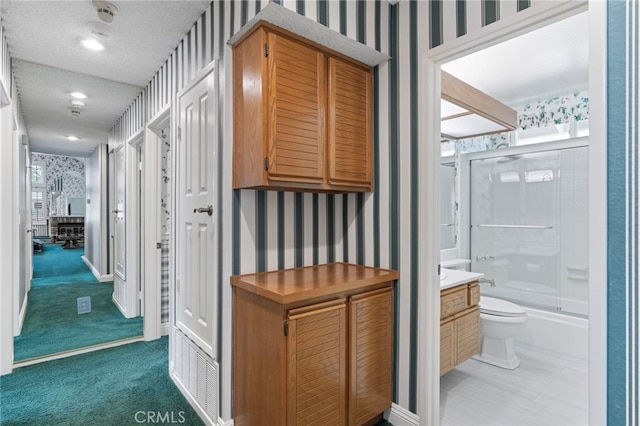 9 Edgestone, Irvine, CA 92606 - corridor with wallpapered walls and a textured ceiling