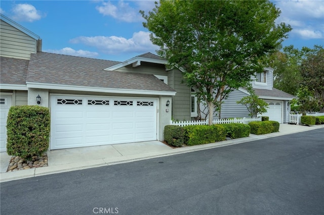 9 Edgestone, Irvine, CA 92606 - view of front of property featuring roof with shingles and an attached garage