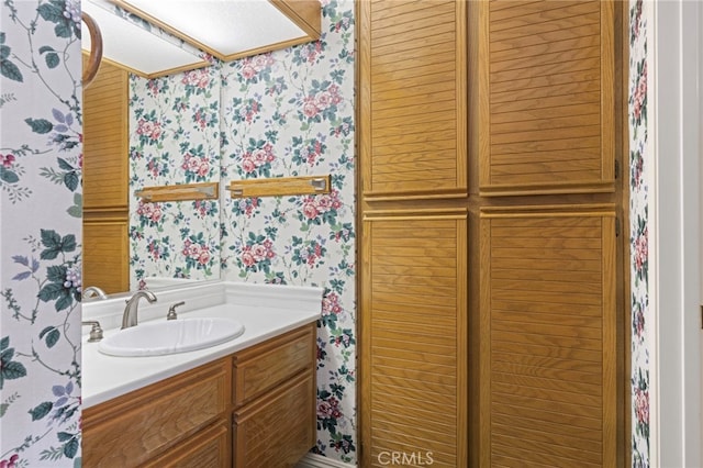 9 Edgestone, Irvine, CA 92606 - bathroom with wallpapered walls and vanity