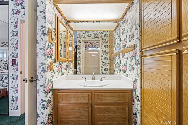 9 Edgestone, Irvine, CA 92606 - bathroom featuring wallpapered walls and vanity