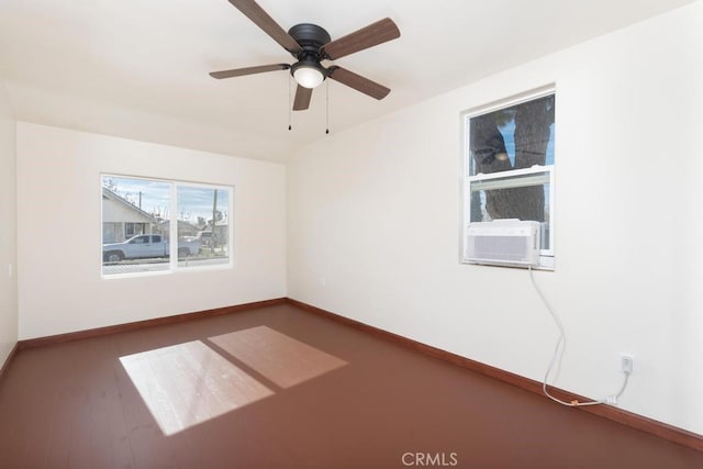 306 Belle Ave, Bakersfield, CA 93308 - spare room with cooling unit, baseboards, ceiling fan, and wood finished floors