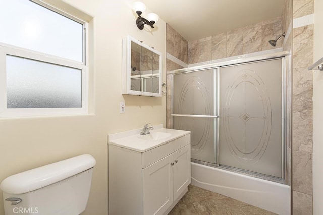 306 Belle Ave, Bakersfield, CA 93308 - full bathroom with vanity, enclosed tub / shower combo, and toilet