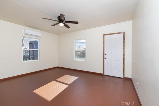 306 Belle Ave, Bakersfield, CA 93308 - unfurnished room with a wall mounted AC, a ceiling fan, baseboards, and wood finished floors