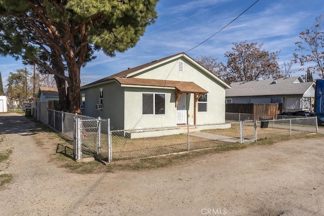 306 Belle Ave, Bakersfield, CA 93308 - bungalow with stucco siding and a gate