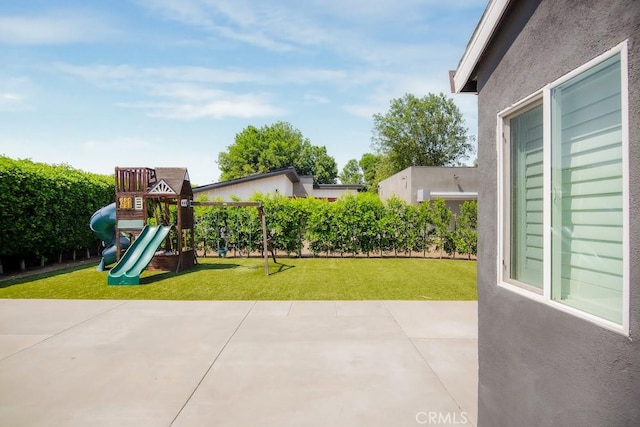 1923119229 Cantara St, Reseda, CA 91335 - view of green lawn featuring a playground and a patio