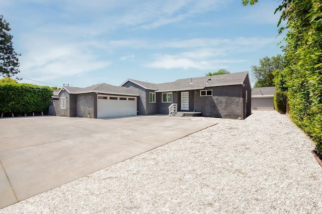1923119229 Cantara St, Reseda, CA 91335 - ranch-style house featuring a garage, stucco siding, and concrete driveway
