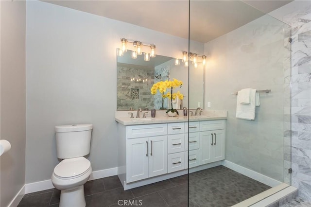 1923119229 Cantara St, Reseda, CA 91335 - full bath featuring double vanity, toilet, tile patterned flooring, tiled shower, and baseboards
