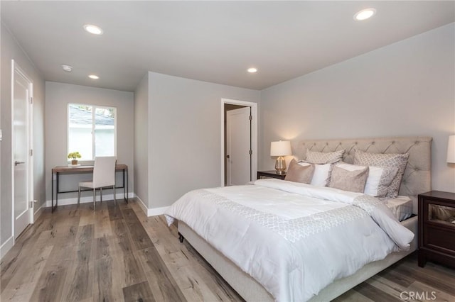 1923119229 Cantara St, Reseda, CA 91335 - bedroom featuring wood finished floors, recessed lighting, and baseboards