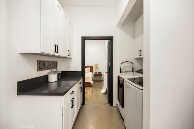 1923119229 Cantara St, Reseda, CA 91335 - laundry room with cabinet space and washer and clothes dryer
