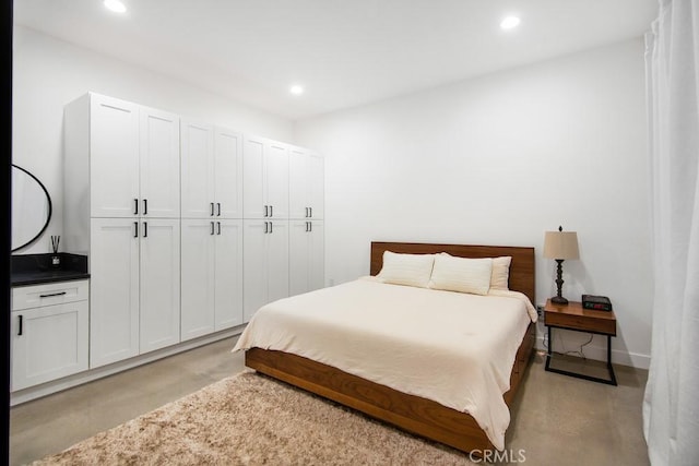 1923119229 Cantara St, Reseda, CA 91335 - bedroom featuring recessed lighting, concrete flooring, and a closet