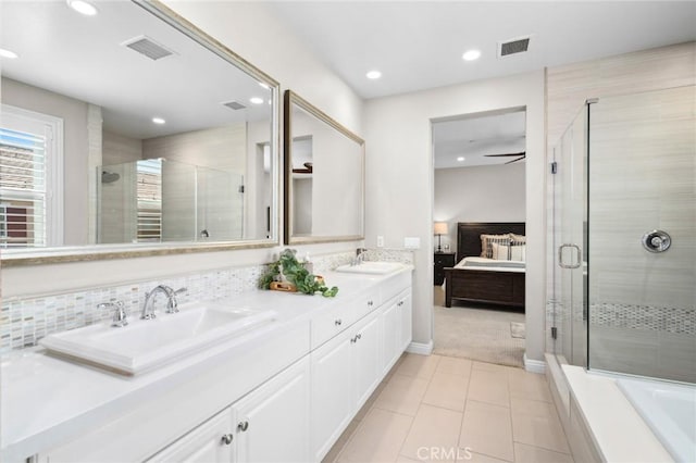 108 Sideways, Irvine, CA 92618 - bathroom featuring a shower stall, double vanity, connected bathroom, recessed lighting, and tile patterned flooring