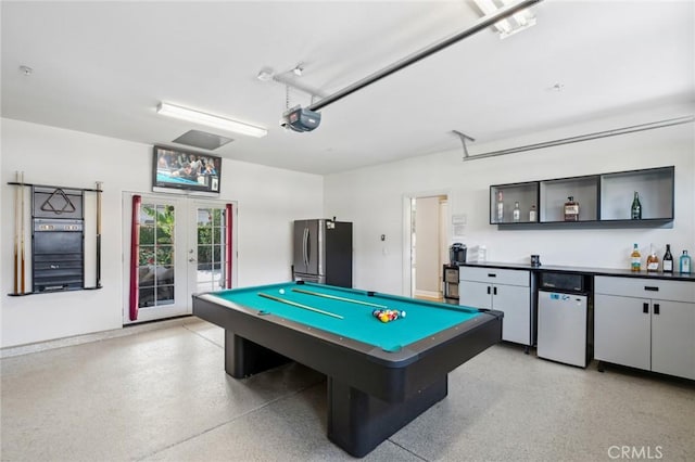 108 Sideways, Irvine, CA 92618 - game room featuring dark speckled floor, billiards table, french doors, a garage, and a dry bar