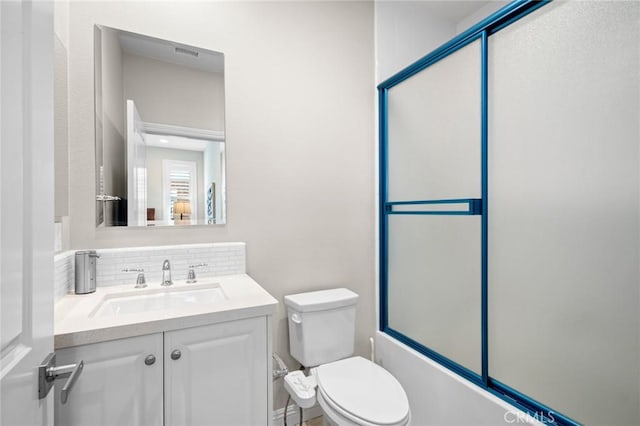 108 Sideways, Irvine, CA 92618 - bathroom with vanity, shower / bath combination with glass door, and backsplash