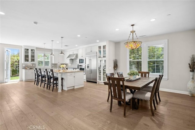 108 Sideways, Irvine, CA 92618 - dining space featuring light wood-type flooring and recessed lighting