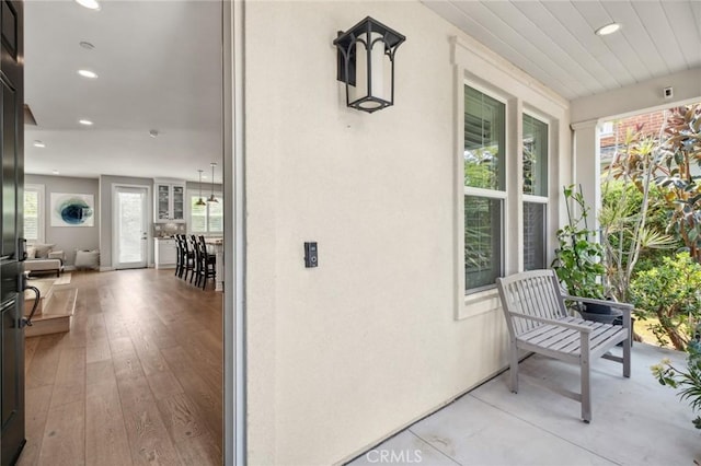 108 Sideways, Irvine, CA 92618 - property entrance featuring covered porch and stucco siding