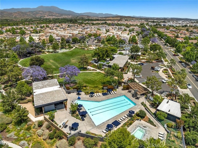 108 Sideways, Irvine, CA 92618 - aerial view of property and surrounding area featuring a mountainous background and nearby suburban area