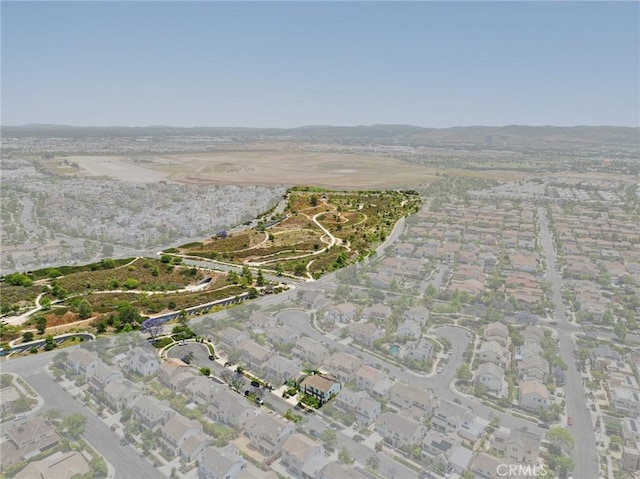108 Sideways, Irvine, CA 92618 - aerial view of property's location featuring nearby suburban area and a mountainous background