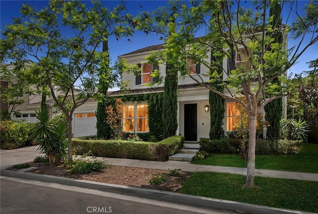 108 Sideways, Irvine, CA 92618 - view of front of home with a garage and stucco siding