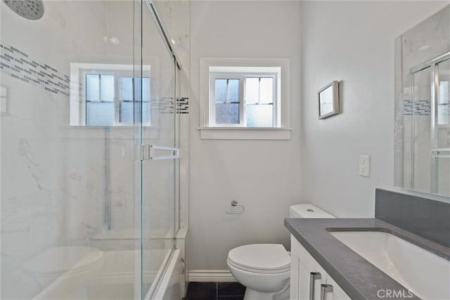 3610 Kinney St, Los Angeles, CA 90065 - bathroom with toilet, vanity, tile patterned flooring, and bath / shower combo with glass door