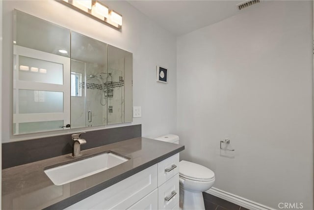 3610 Kinney St, Los Angeles, CA 90065 - bathroom with vanity, a marble finish shower, toilet, baseboards, and tile patterned floors