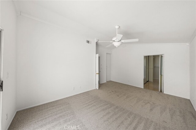 40661 Via Amapola, Murrieta, CA 92562 - unfurnished room with carpet, ornamental molding, and a ceiling fan