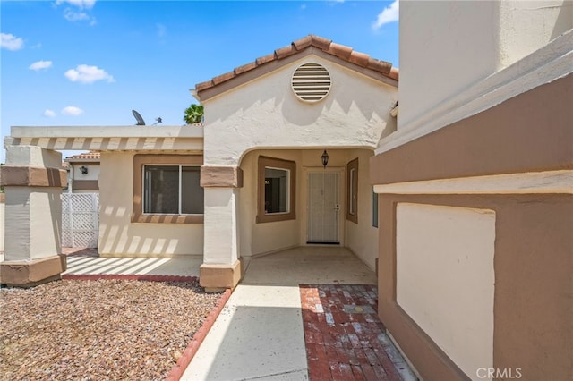 40661 Via Amapola, Murrieta, CA 92562 - doorway to property featuring stucco siding