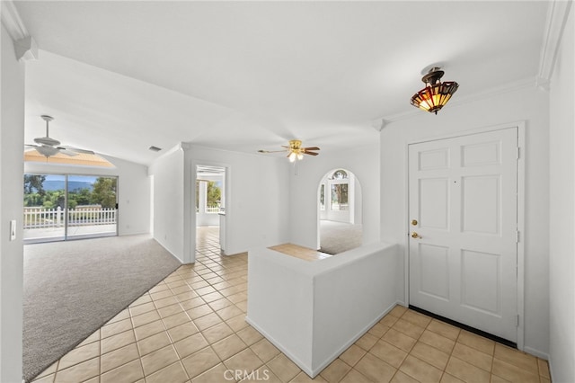 40661 Via Amapola, Murrieta, CA 92562 - foyer featuring ceiling fan, light tile patterned floors, light colored carpet, lofted ceiling, and crown molding