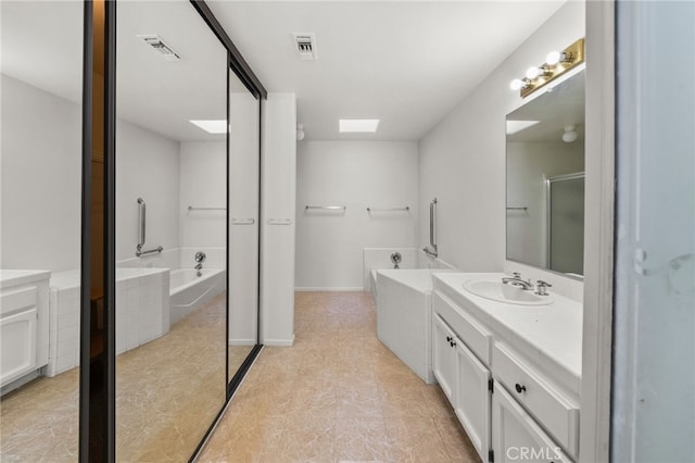 40661 Via Amapola, Murrieta, CA 92562 - bathroom with vanity and a garden tub