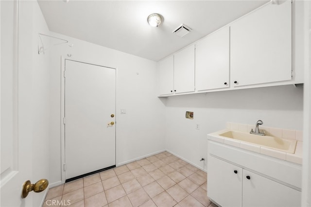 40661 Via Amapola, Murrieta, CA 92562 - laundry area with washer hookup, cabinet space, and baseboards