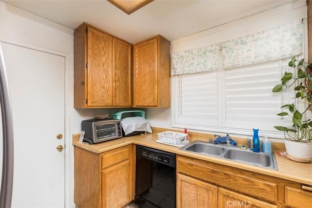 162 Peppertree Way, San Jacinto, CA 92583 - kitchen featuring black dishwasher, a sink, light countertops, and brown cabinets