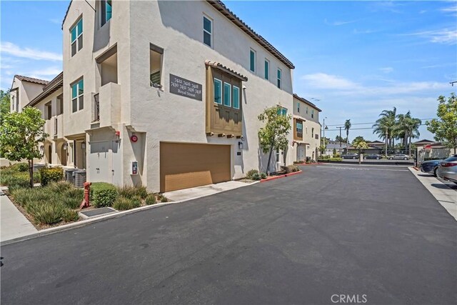 7436 Royal St, Buena Park, CA 90620 - view of asphalt road featuring a residential view and curbs