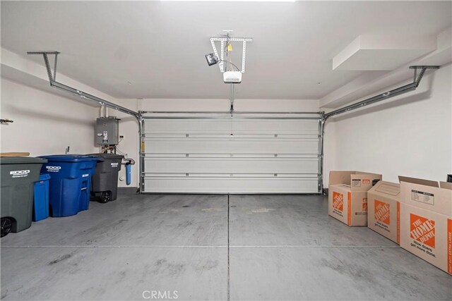 7436 Royal St, Buena Park, CA 90620 - garage with a garage door opener and water heater