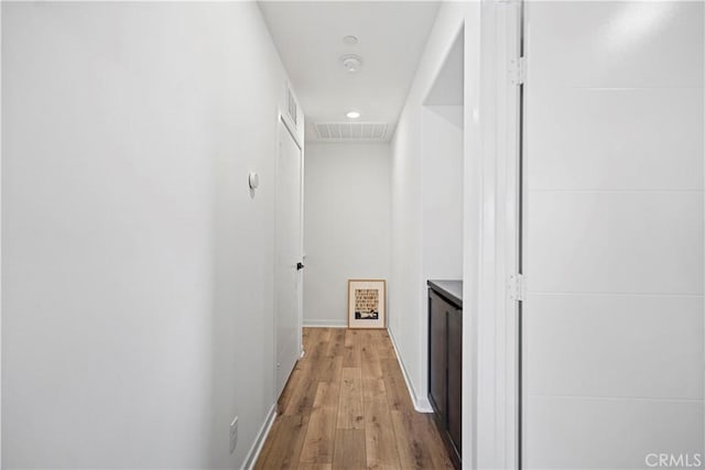 7436 Royal St, Buena Park, CA 90620 - hall featuring wood finished floors, attic access, and baseboards