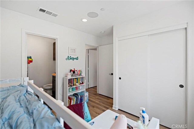 7436 Royal St, Buena Park, CA 90620 - bedroom with wood finished floors and a closet