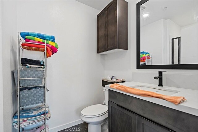 7436 Royal St, Buena Park, CA 90620 - full bath with vanity, baseboards, and toilet