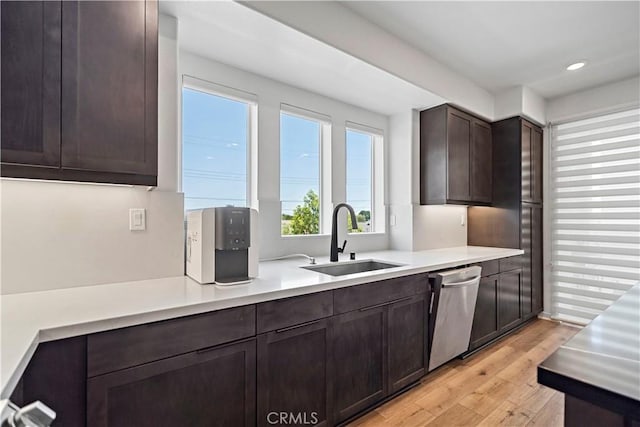 7436 Royal St, Buena Park, CA 90620 - kitchen with a sink, dishwasher, dark brown cabinetry, light countertops, and recessed lighting