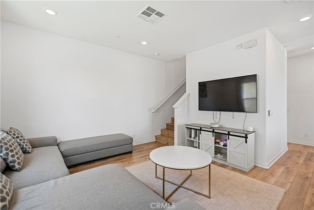 7436 Royal St, Buena Park, CA 90620 - living room featuring light wood finished floors, stairway, recessed lighting, and baseboards