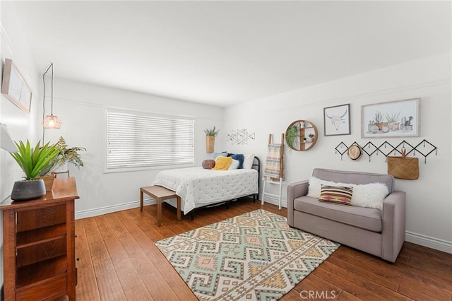 1270 Belle Rd, Calimesa, CA 92320 - bedroom featuring wood-type flooring and baseboards