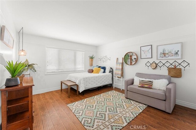 1270 Belle Rd, Calimesa, CA 92320 - bedroom with hardwood / wood-style flooring and baseboards