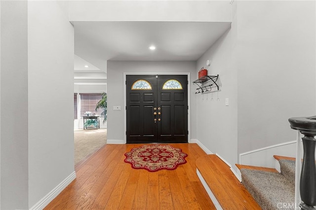 1270 Belle Rd, Calimesa, CA 92320 - foyer with wood-type flooring, recessed lighting, stairs, and baseboards
