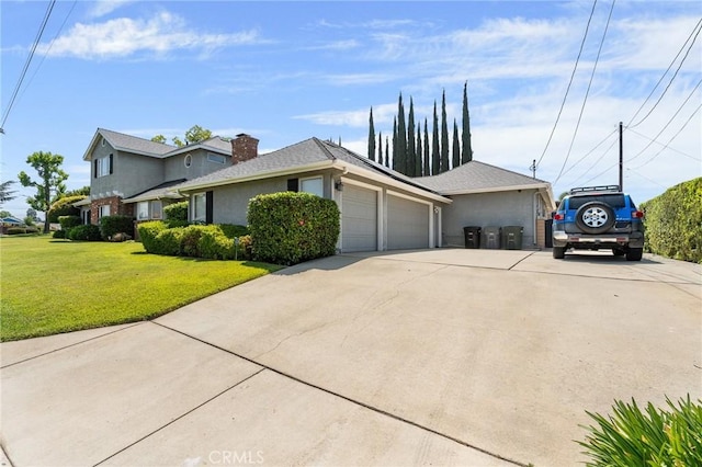 1270 Belle Rd, Calimesa, CA 92320 - view of front of property with concrete driveway, a front lawn, a garage, and stucco siding