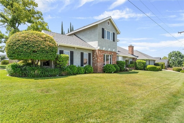 1270 Belle Rd, Calimesa, CA 92320 - rear view of house featuring stucco siding and a yard