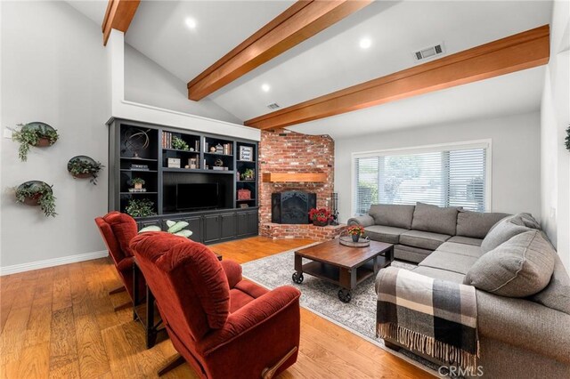 1270 Belle Rd, Calimesa, CA 92320 - living room with light wood-style floors, a brick fireplace, and recessed lighting