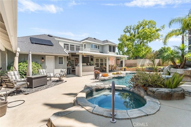1270 Belle Rd, Calimesa, CA 92320 - view of pool featuring an in-ground hot tub, an outdoor living space, a patio, a fenced backyard, and a ceiling fan